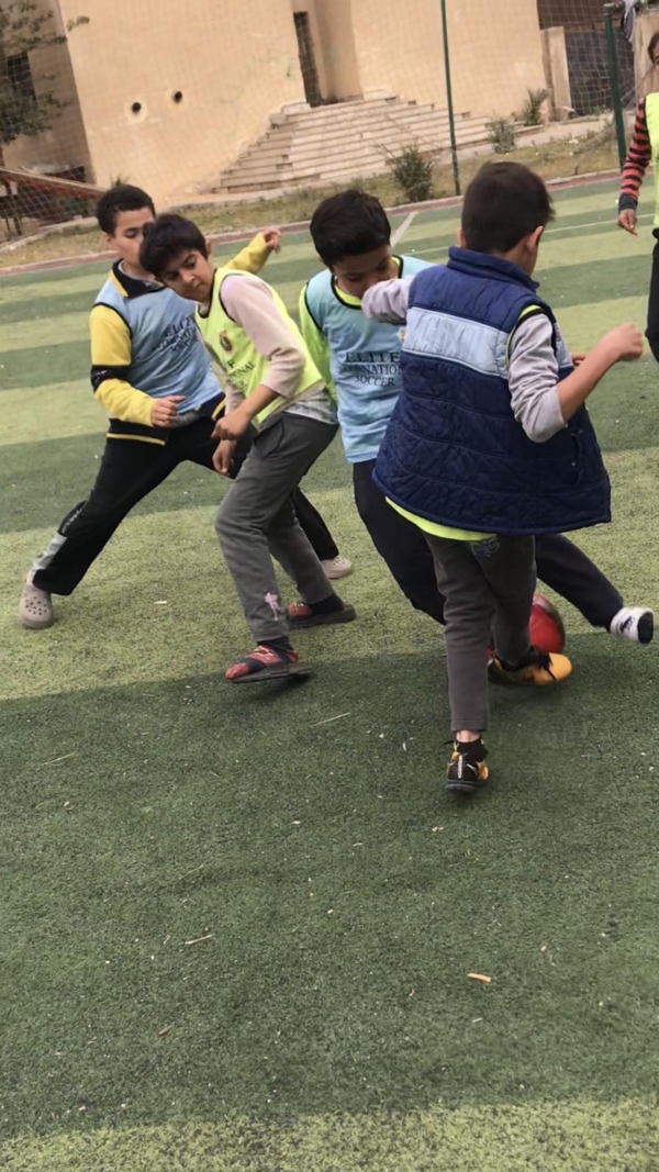 Playing A Match!!! – Special thanks to Play Soccer Academy (formerly known as Elite International Soccer) for the generous donation of 35 bibs (pinnies) for our players to play a match!