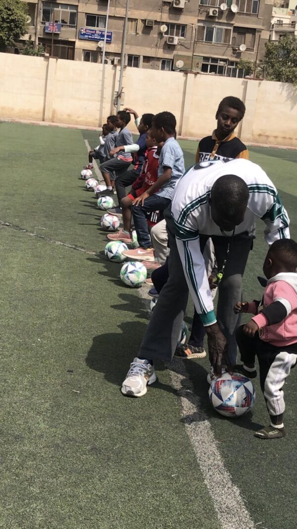 Dribbling with the Players of Youth Support Volunteer Organization
